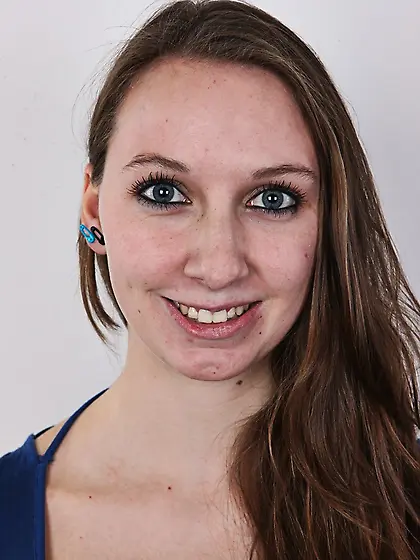 Long-haired busty brunette shot