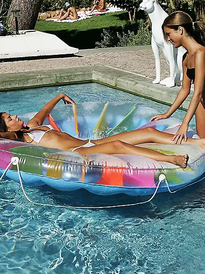 Wet bikini girls Jackie and Lucy Lee have fun licking each other