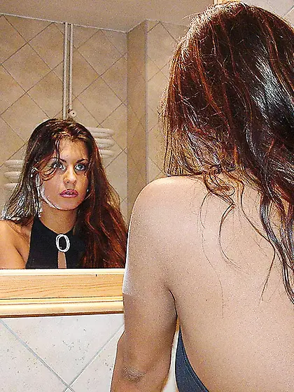 The sexy Dorothy Black strips down in the shower to show off her