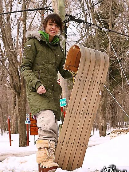 Ariel Rebel sleighs,  wallows in snow and even performs a stripte