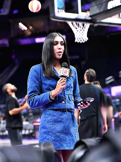 Kendra Andrews in a blue skirt