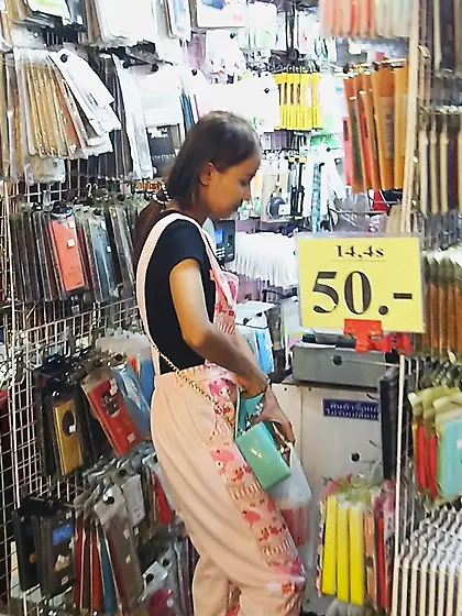 Edgy Thai babe named Puy is going to smoke and tease in overalls