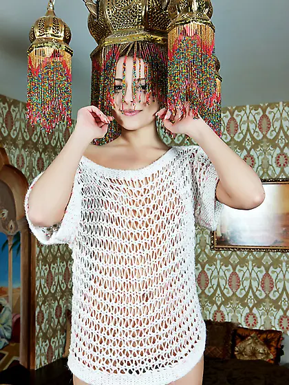 Brunette teen flashing her pussy while she's on all fours,