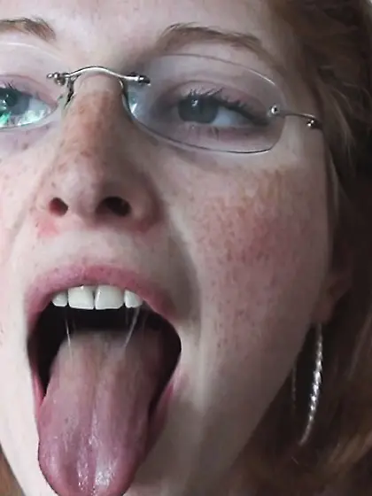 Big-breasted redhead milf glasses