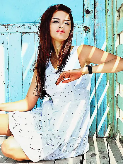 Stockings-clad brown-eyed Latina shows off her perfect body on a