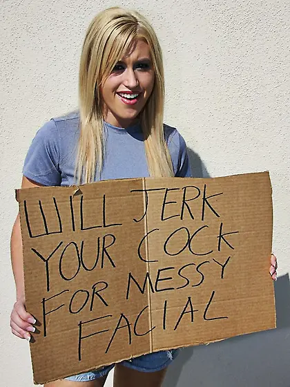 Smiling small titted nude blonde Megan Moore jerks cock for mess