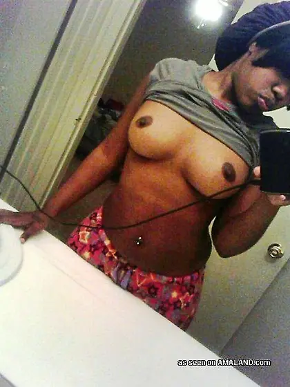 Short-haired ebony flashing pussy