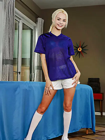 Fragile blonde seductress teases with her small tits and nude fl