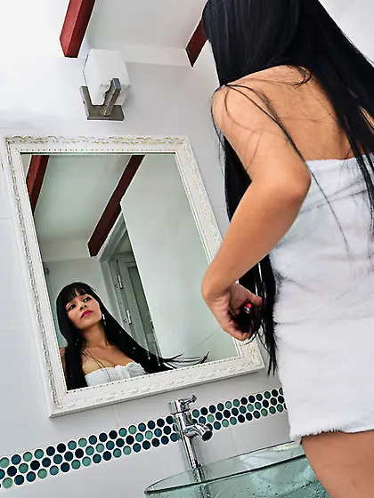 Magnetic brunette wearing white