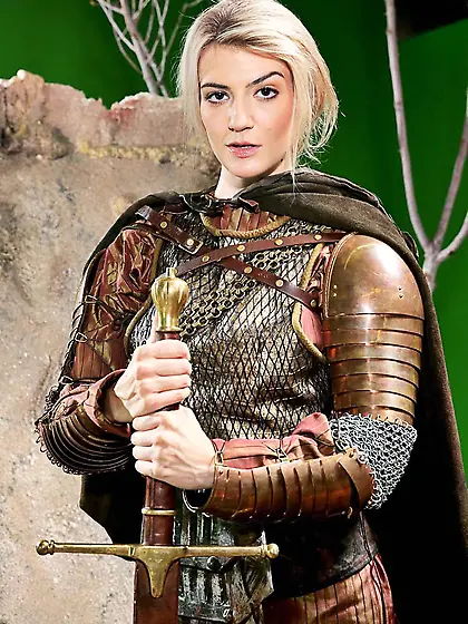 Blonde in erotic costume Amanda Tate shows her passion in the wi