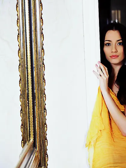 Sexy brunette Zsanett Tormay poses wrapped in silk then shows of