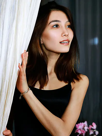 Flat-chested Asian brunette takes off her black dress to show he