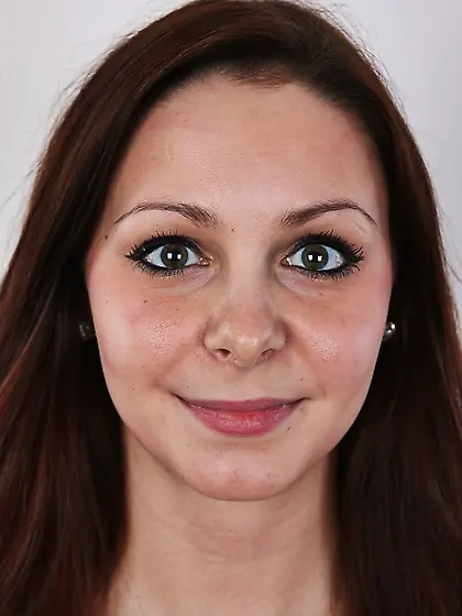 Curvy long-haired brunette bombshell