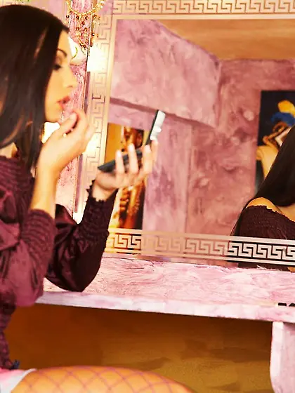 Spicy posing scene from gorgeous brunette babe Evelyn Lory in pu