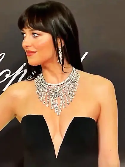 Dakota Johnson in a plunging black dress