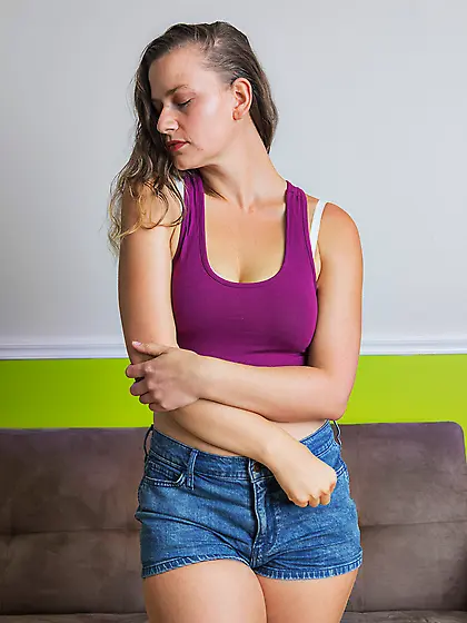 Naturally busty babe is here to show her bum and look good