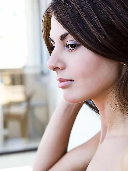 Elegant brunette babe Astrud A takes a dip in the jacuzzi and po