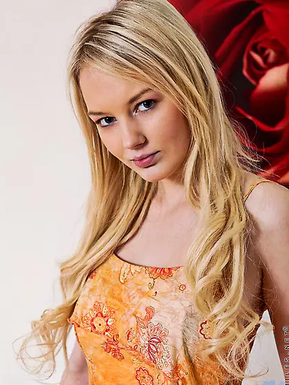 Blonde haired teen girl Lynne Twistys gets naked and touches her