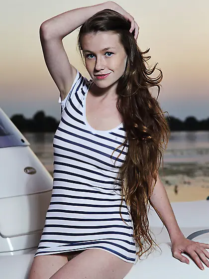 Adorable teen enjoys boat