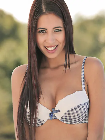 Leggy teen in cute lingerie ends up getting naked on a recliner