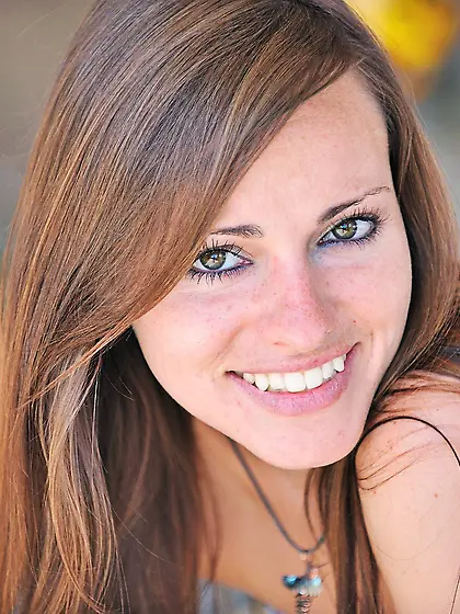 Smiling teen offers lots more than just some random upskirt shot