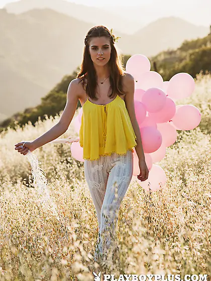 Charming young girl undresses