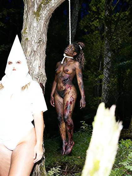 Negro Hangs Behind Aryan KKK Girl