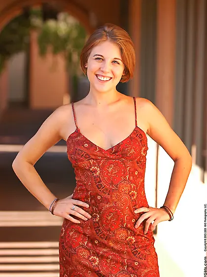 Violet FTV takes her sexy red dress outdoors and teases nude in