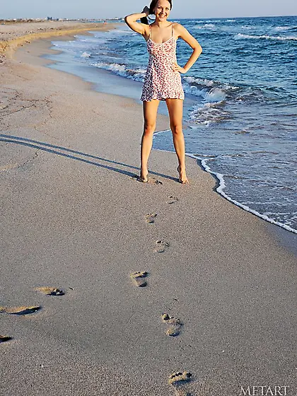 Brunette diva bends over to reveal her pussy as she has fun outd