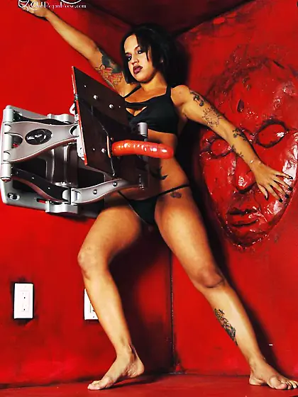 Tattooed brunette bitch Regan Reese strips her black lingerie an