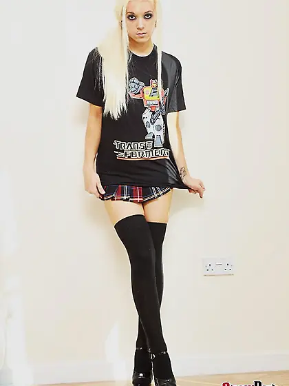 Blonde teen seductively licks