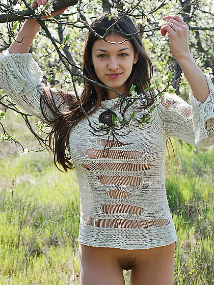 Femjoy Sofie strips her clothes outdoors on the field and shows