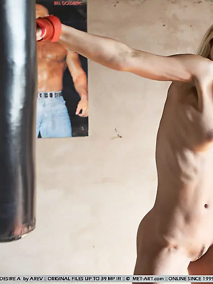 Skinny teen blonde Desire A is fond of boxing and posing in her