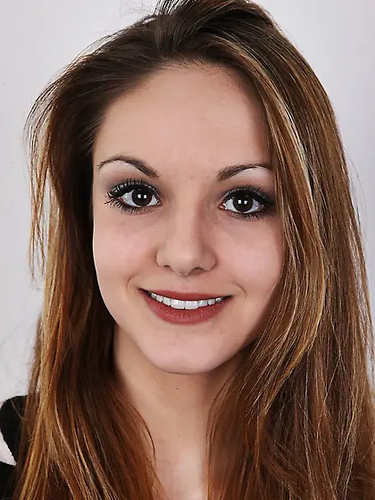 Slim girl with reddish hair and small tits