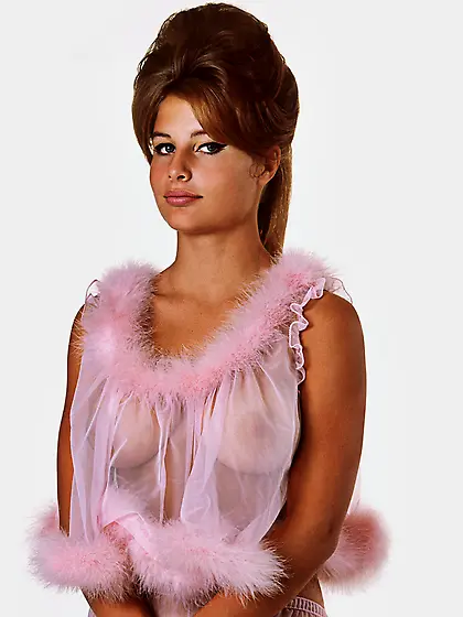 60's Playmate model showing off her flexible...