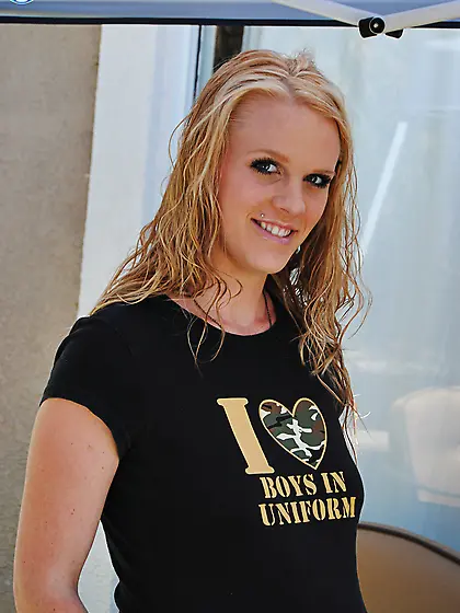 Preggo Kristi posing her pregnant ass on boot camp shorts