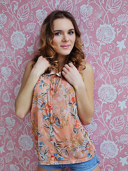 Girly brunette babe lies