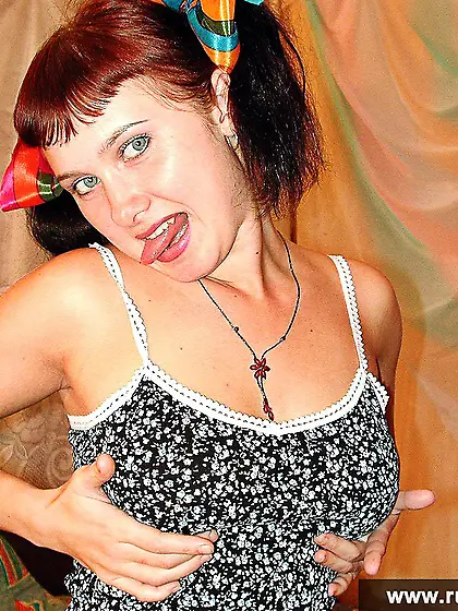 Russian teen brunette masturbating with red dildo