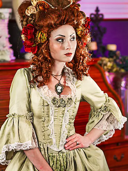 Elegant redhead wearing victorian