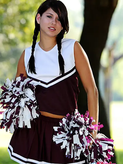 Seductive teen cheerleader Shyla Jennings strips her uniform out