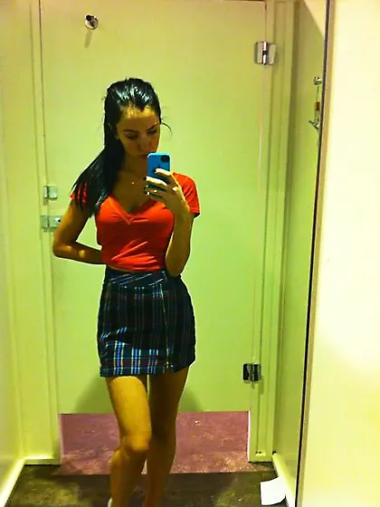 Skirt-wearing ponytailed flashing long