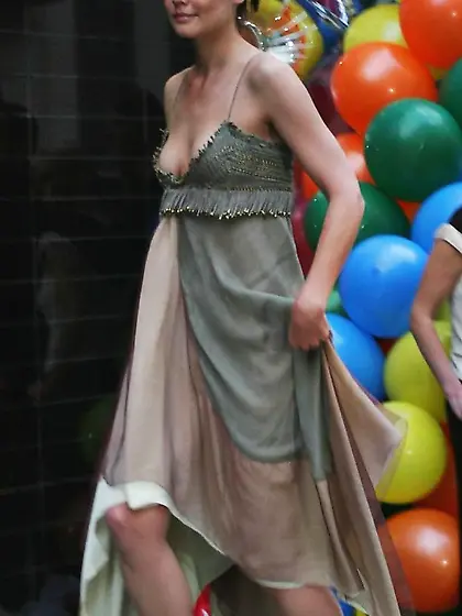 Katie Holmes gives us nipslip