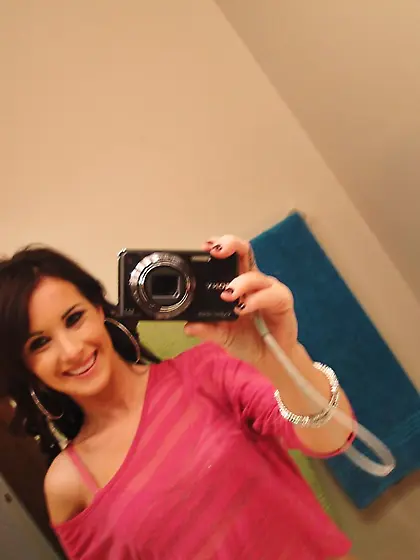 Dark-haired cutie in a pink blouse experiences a huge cock for t