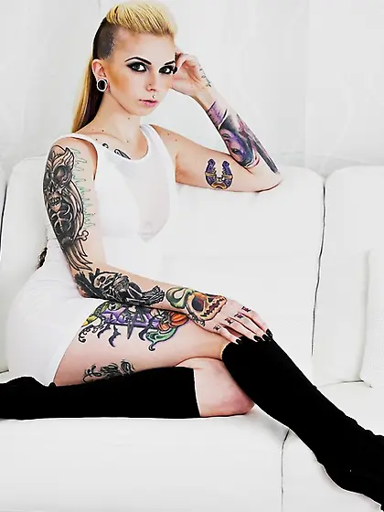 Skinny tattooed angel spreads