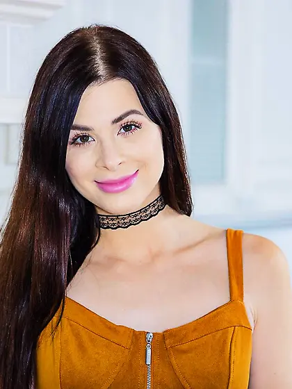 Sweet teen Jenny Doll has fun disrobing and masturbating with a