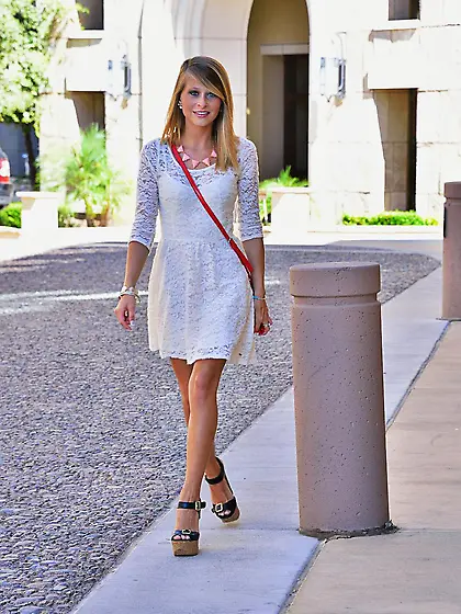 Sassy blonde teen is slowly stripping uncovering inch by inch of