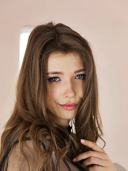 Cute babe Mila Azul finger fucks her hairless pussy on the chair