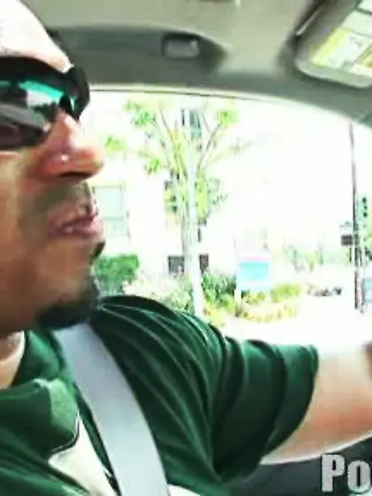 Sporting long ebony locks