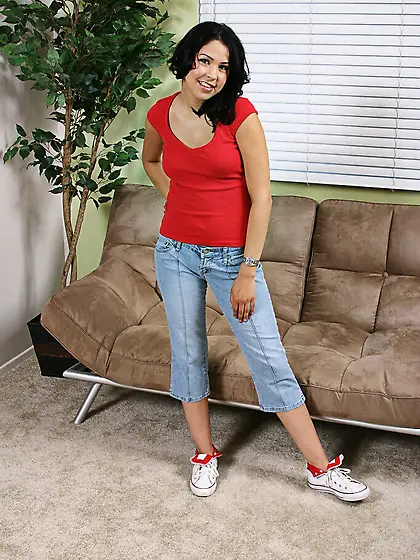 Dark haired Celina Cross poses totally nude and spreads her legs