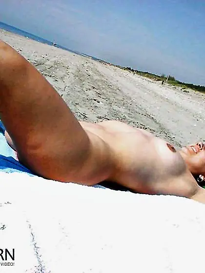 Sunbathing bare and posing